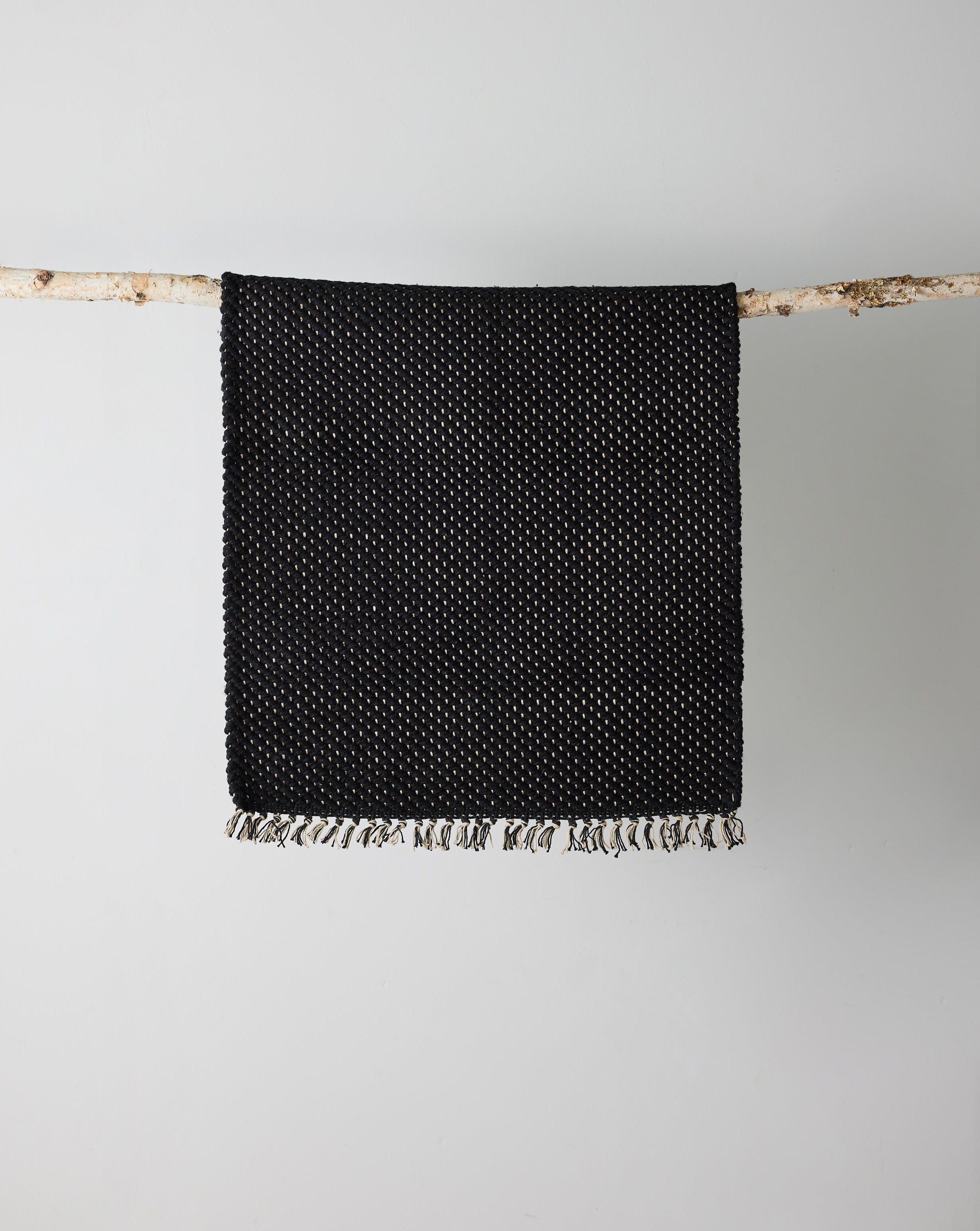 Fischgrät-Matte aus schwarzer Baumwolle