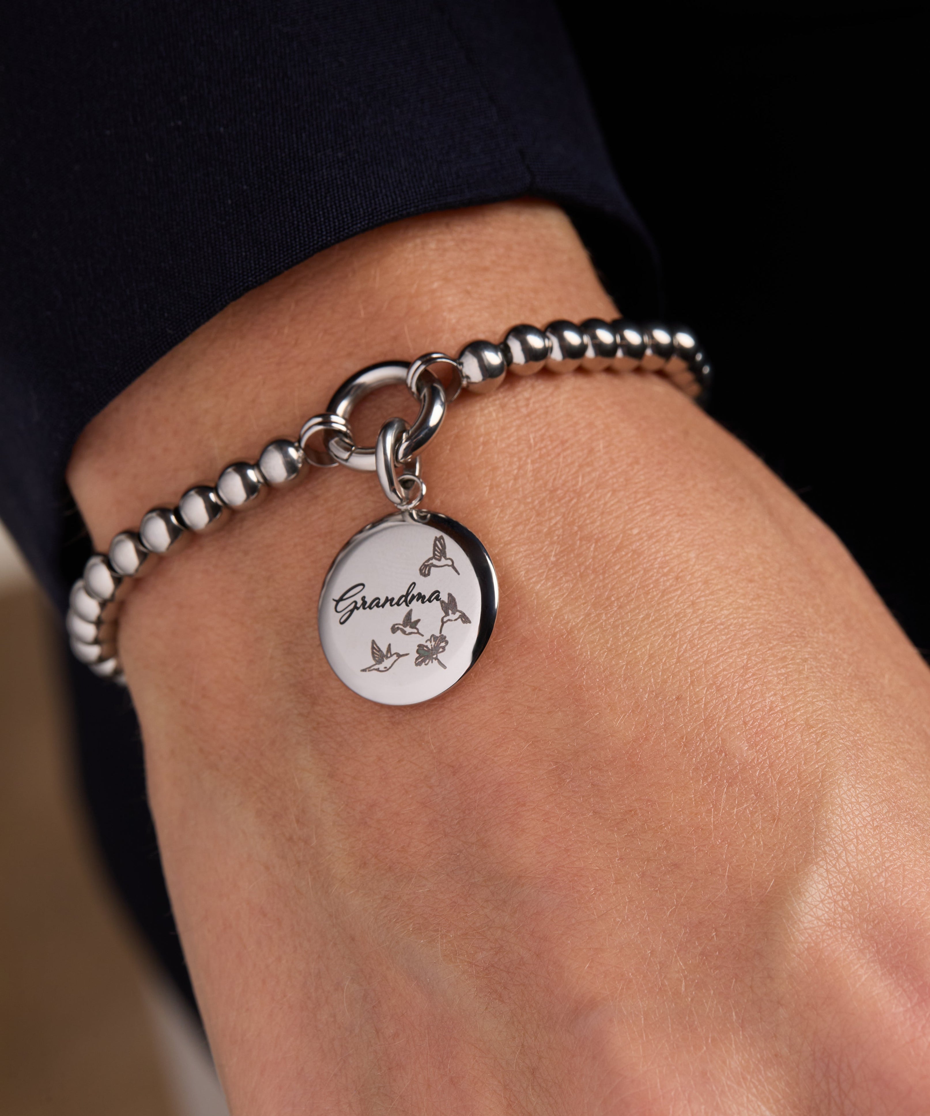 Grandma Hummingbird Disc Charm