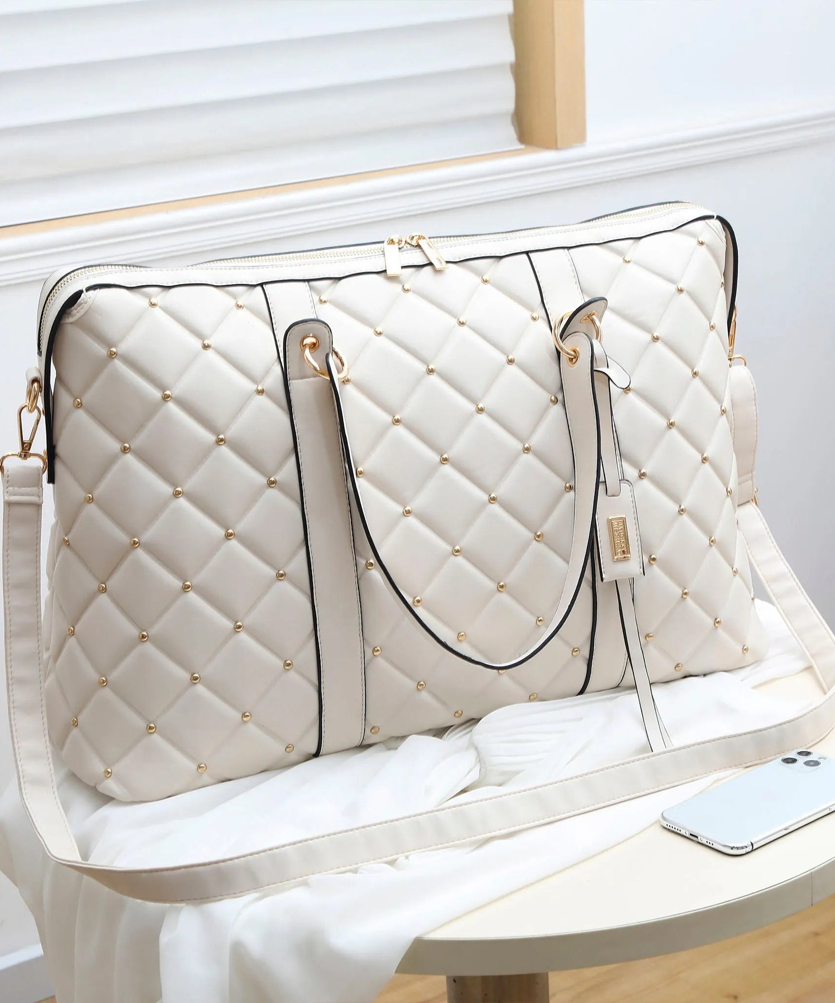 Diamantgesteppte vegane Leder-Weekender-Tasche