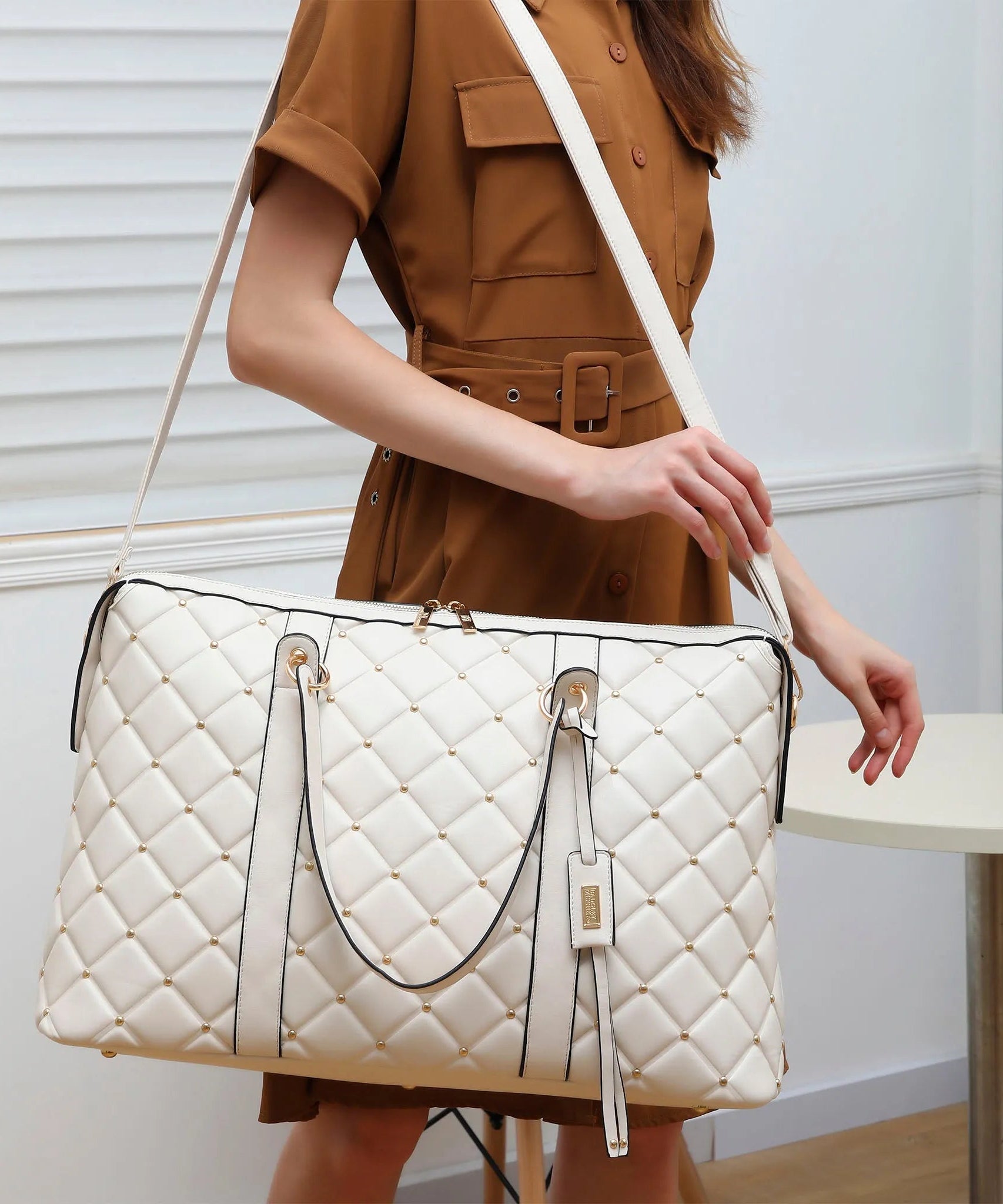 Diamantgesteppte vegane Leder-Weekender-Tasche