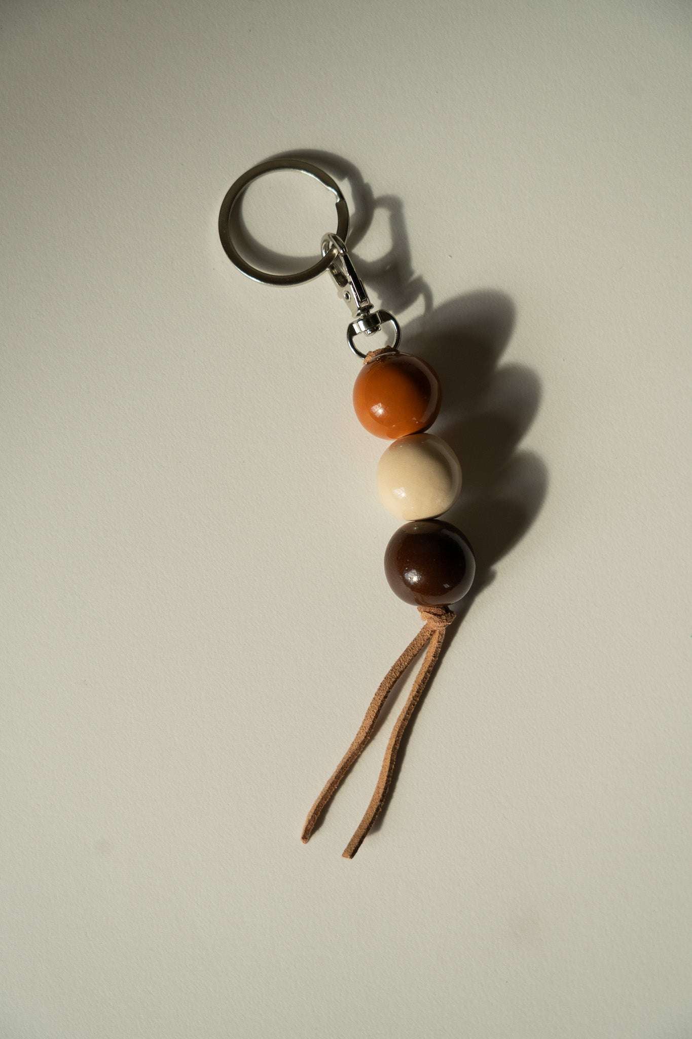 Handmade Ceramic Keychain with Dark Brown Beads