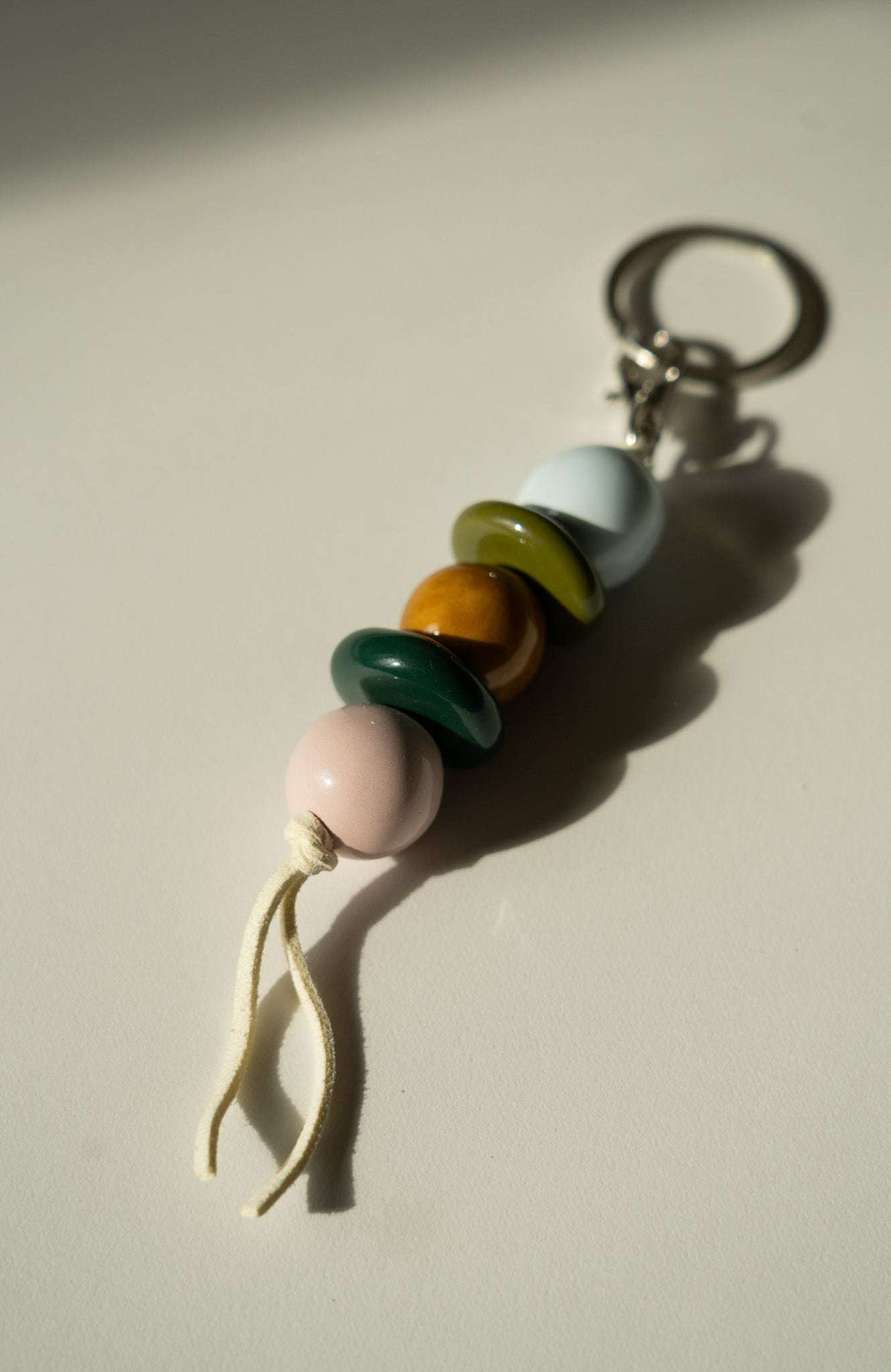 Handmade Ceramic Beaded Keychain in Brown and Green Tones