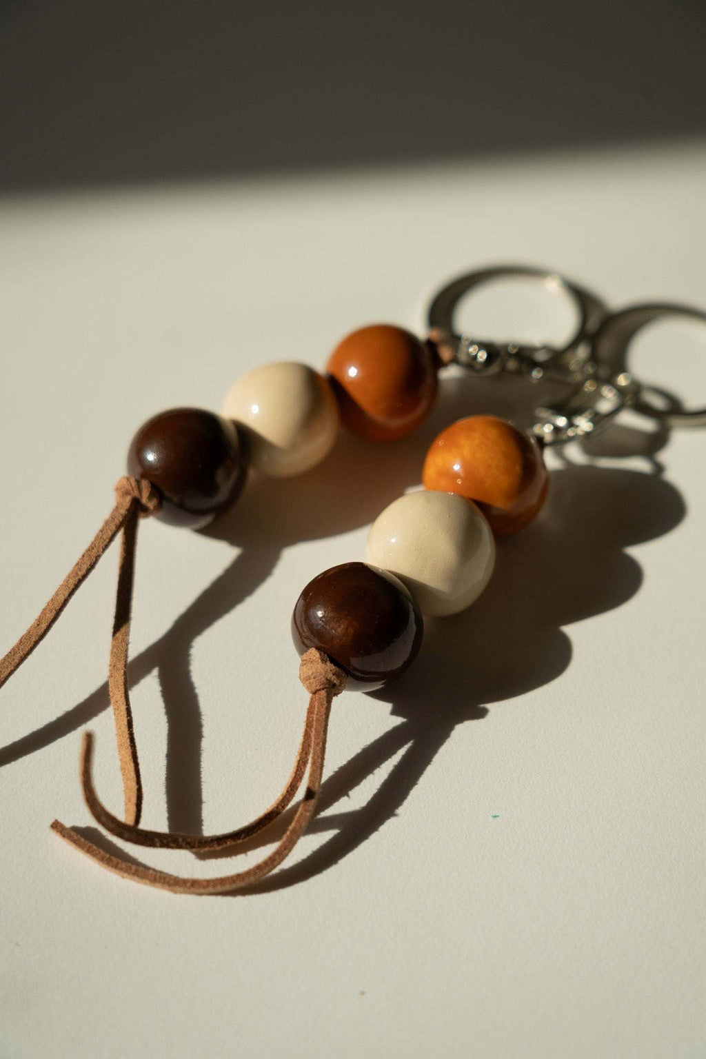 Handmade Ceramic Keychain with Dark Brown Beads