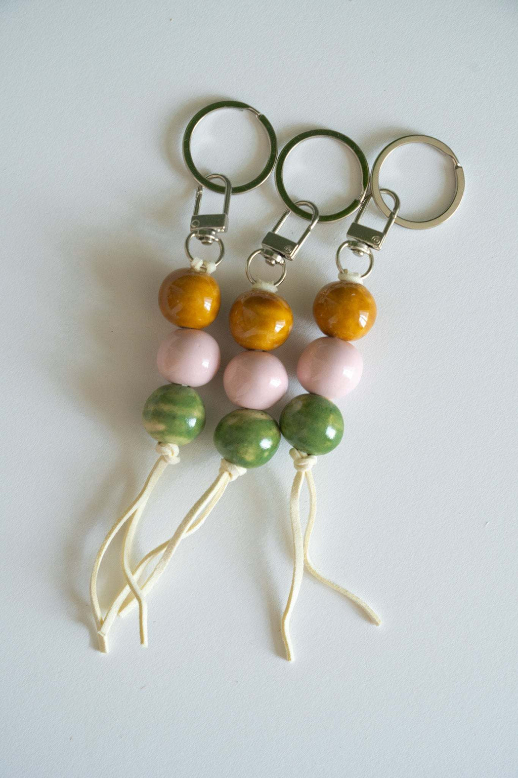 Handmade Ceramic Keychain in Warm Contrast Tones