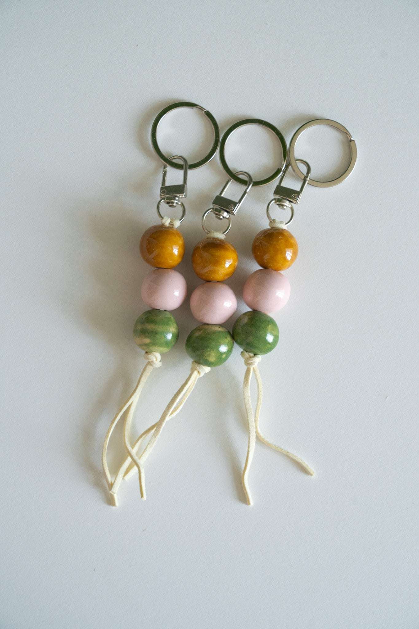 Handmade Ceramic Keychain in Warm Contrast Tones