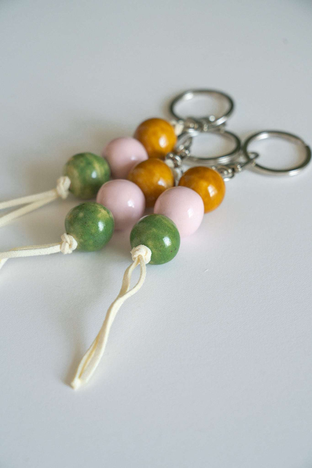 Handmade Ceramic Keychain in Warm Contrast Tones