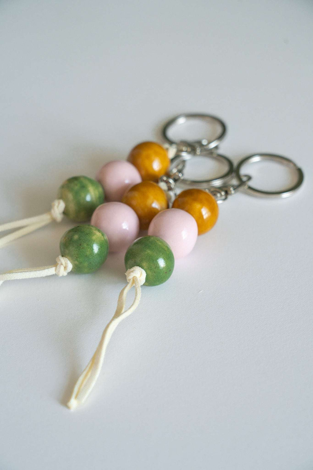 Handmade Ceramic Keychain in Warm Contrast Tones