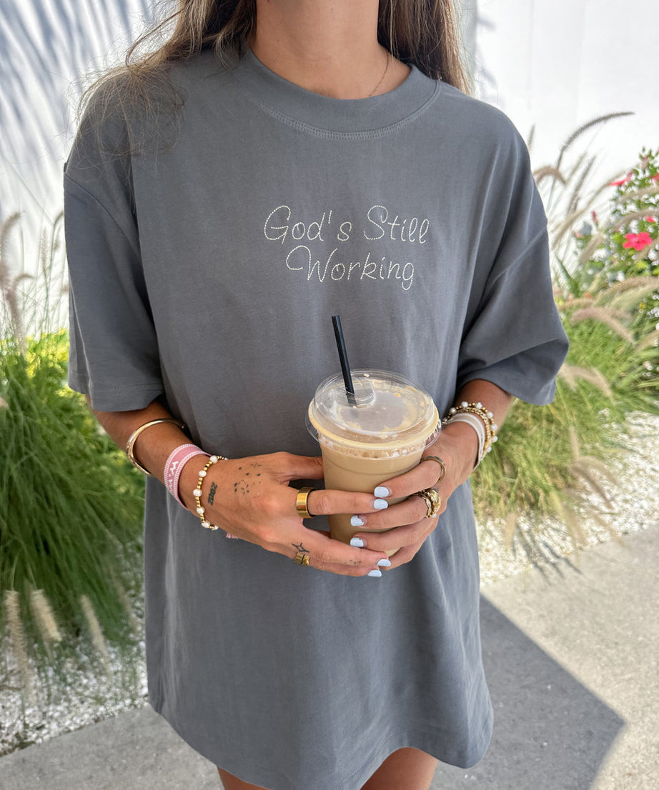 God's Still Working Unisex Tee