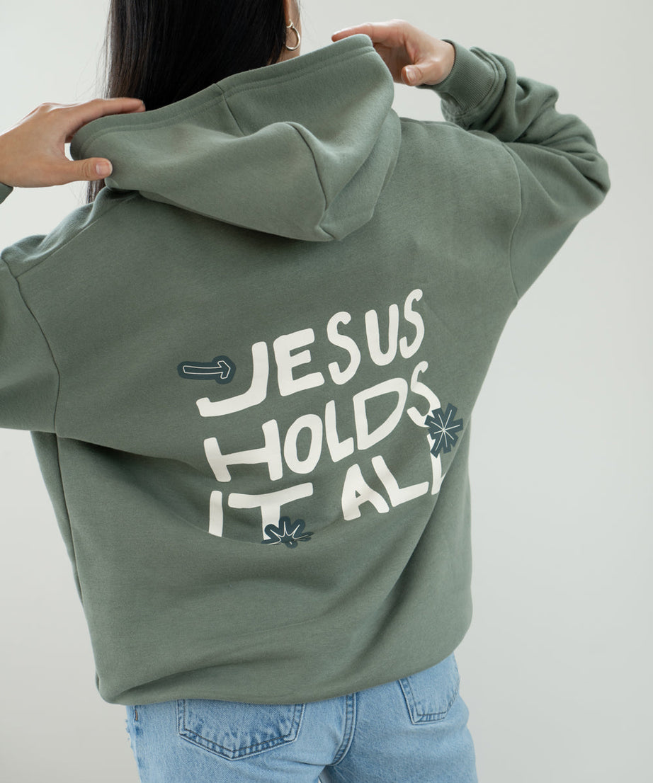 Jesus Holds It All Unisex Hoodie