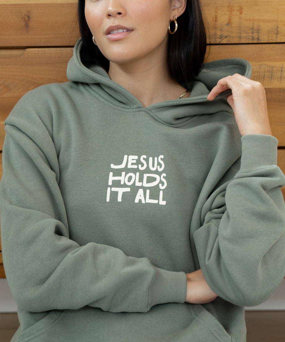 Jesus Holds It All Unisex Hoodie