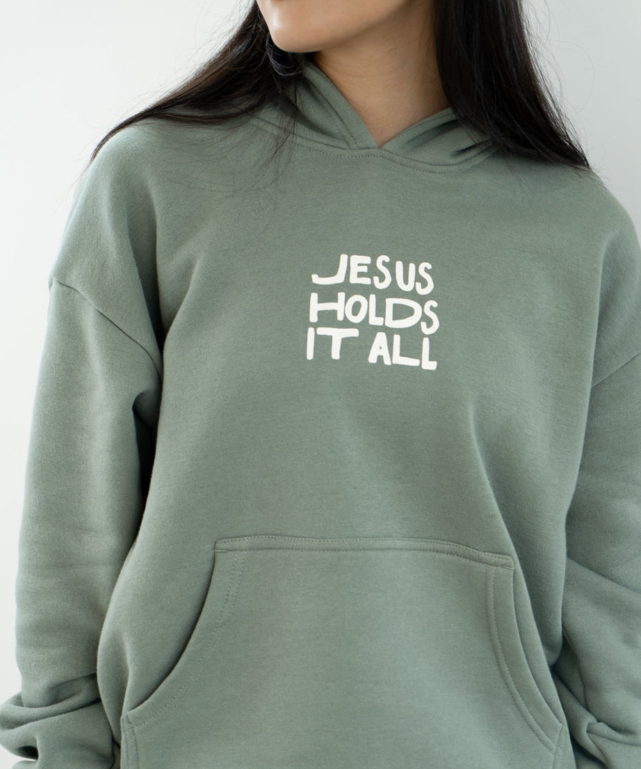 Jesus Holds It All Unisex Hoodie