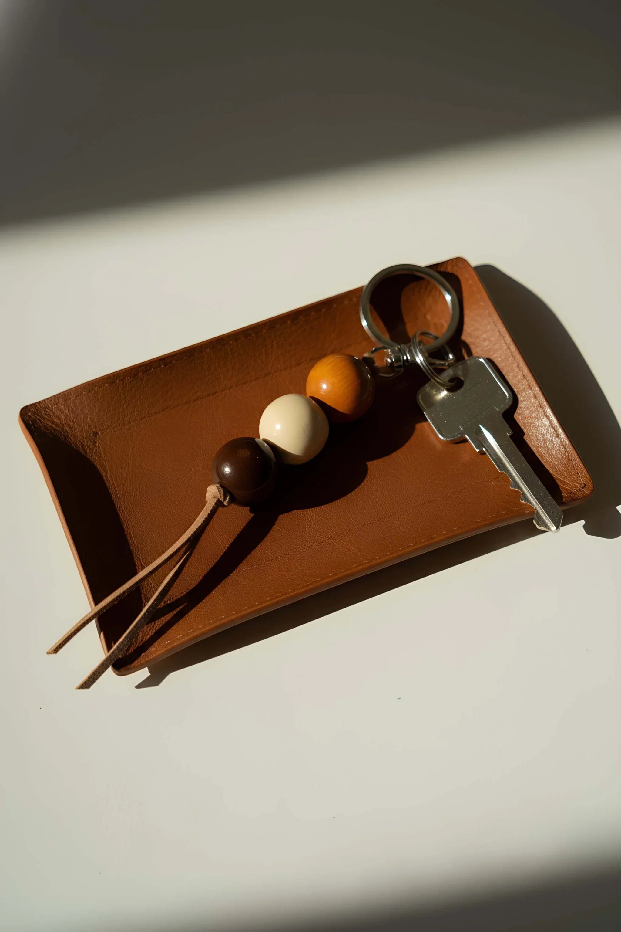 Handmade Ceramic Keychain with Dark Brown Beads