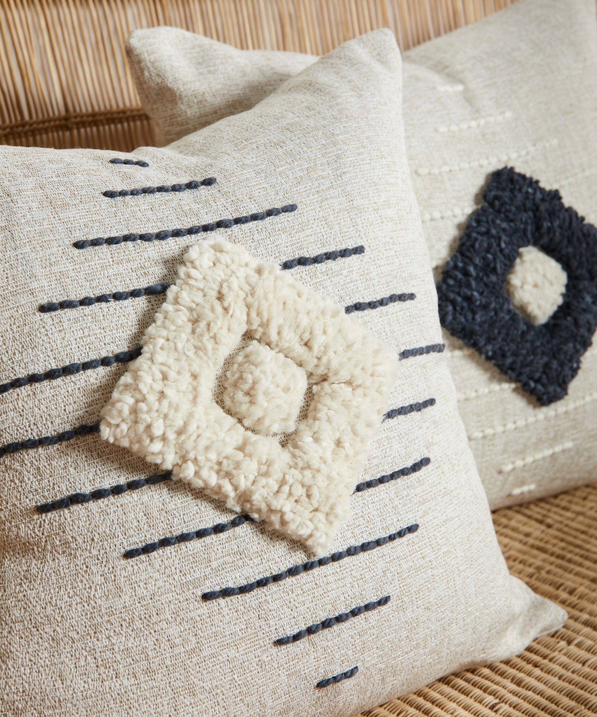 Khanya Throw Pillow in Grey and White