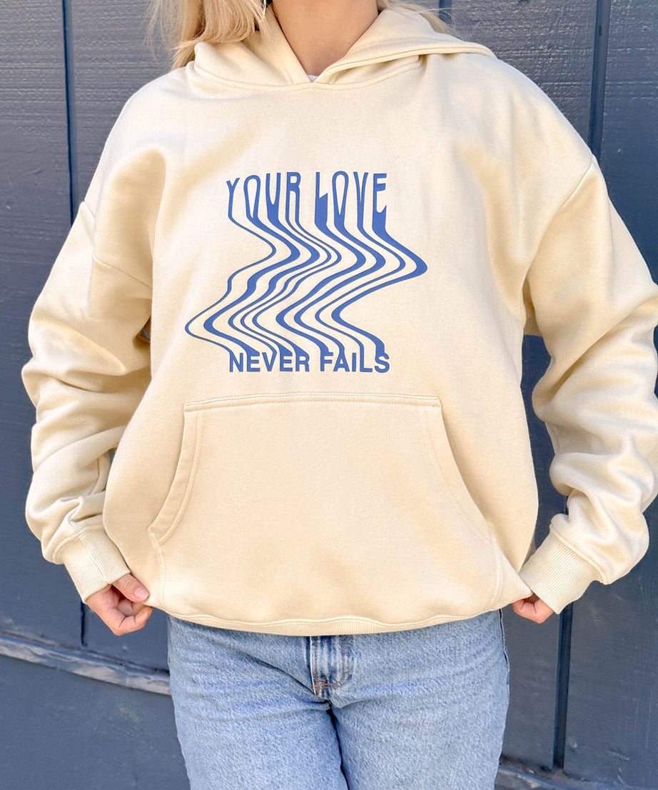 Love Never Fails Cream Unisex Hoodie