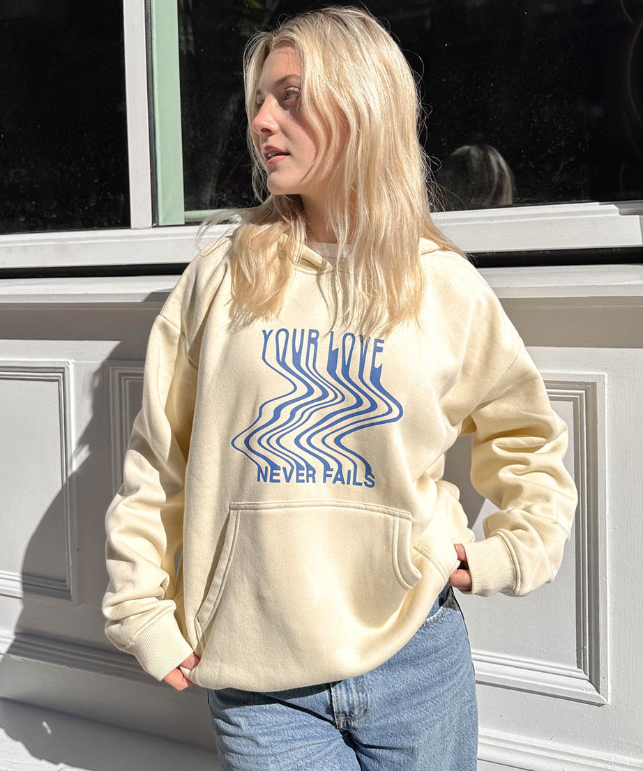 Love Never Fails Cream Unisex Hoodie