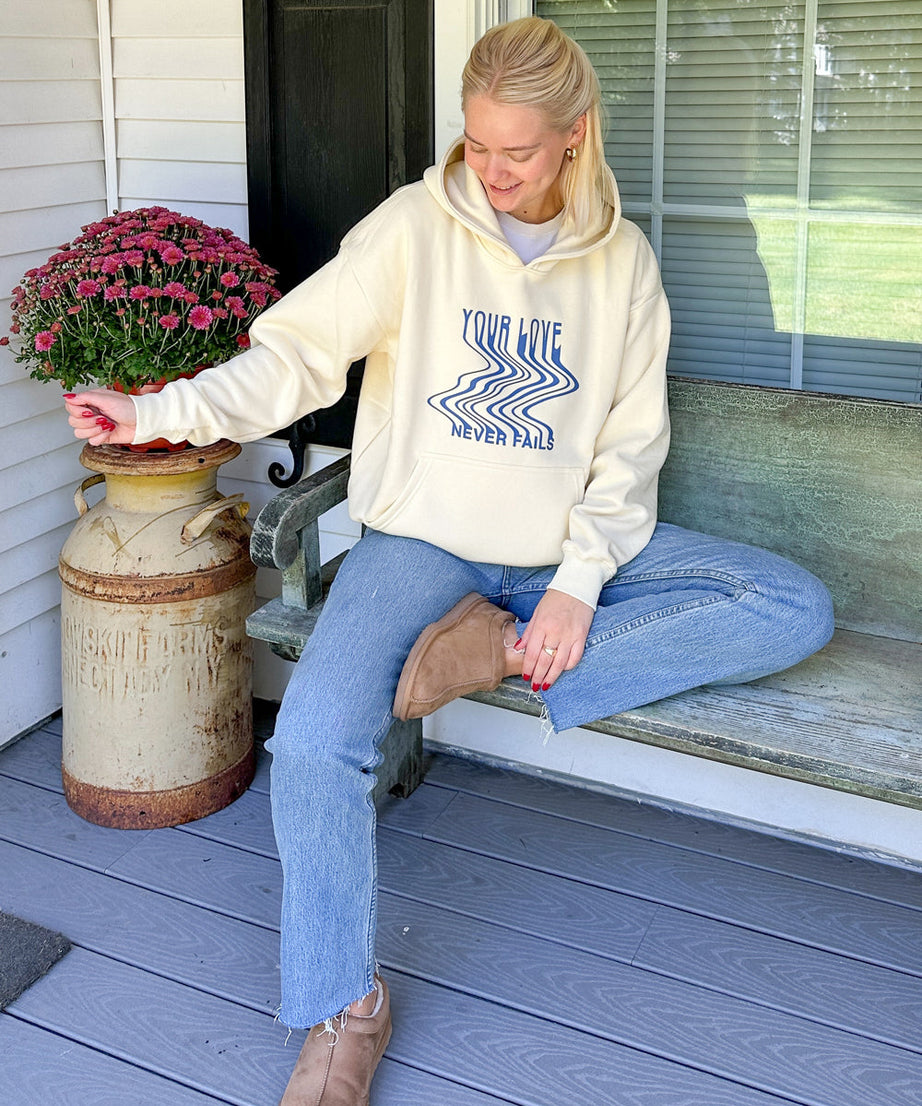 Love Never Fails Cream Unisex Hoodie