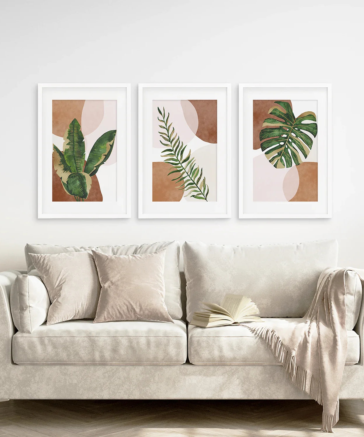 3-teilige Terrakotta Boho Wandkunst. Grüne tropische Blätter