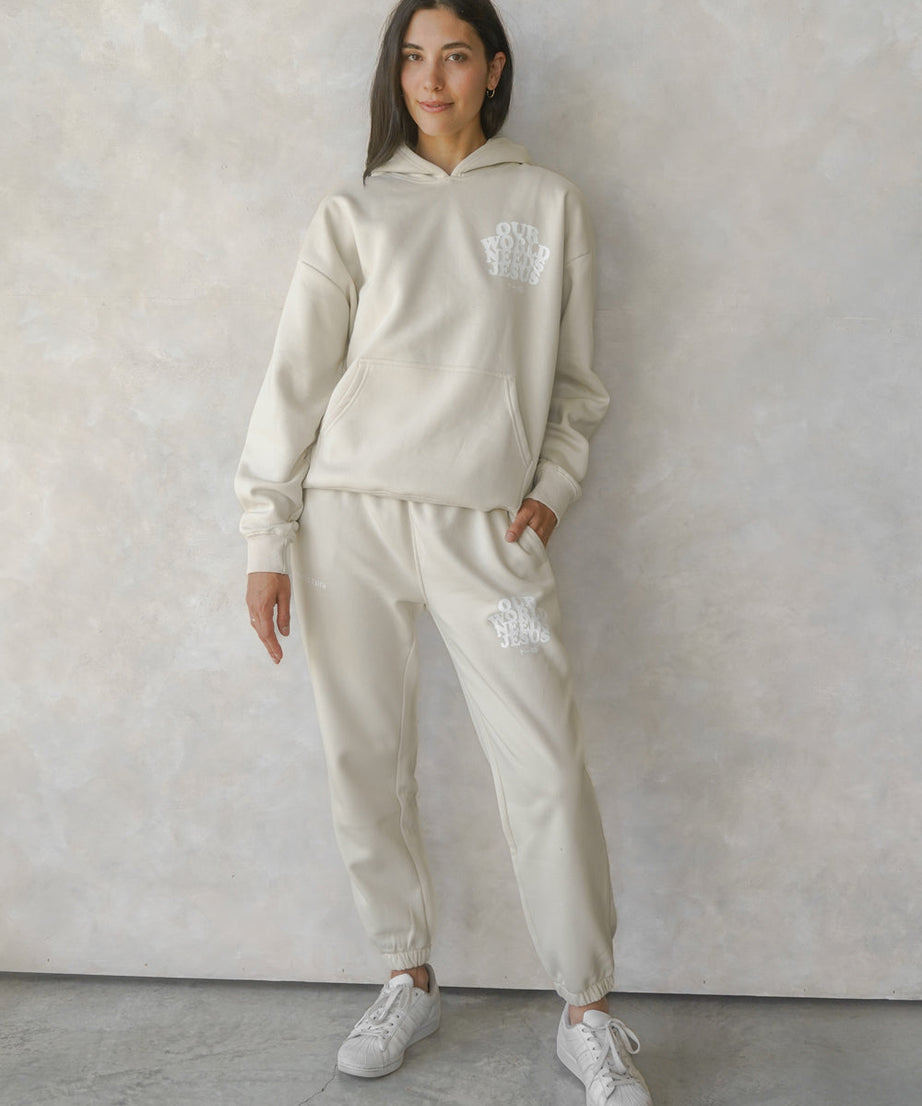 Our World Needs Jesus Beige Unisex Sweatpant