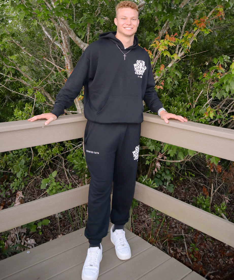 Our World Needs Jesus Black Unisex Sweatpant