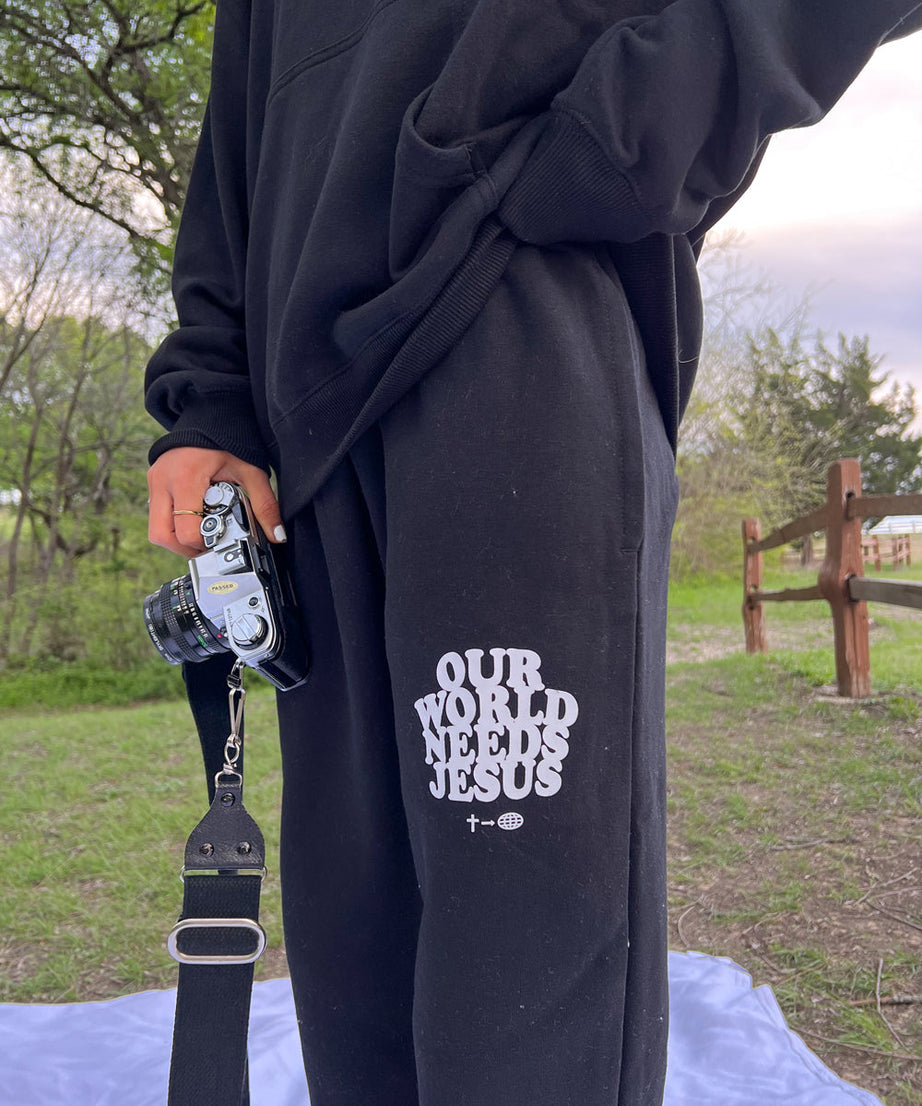 Our World Needs Jesus Black Unisex Sweatpant