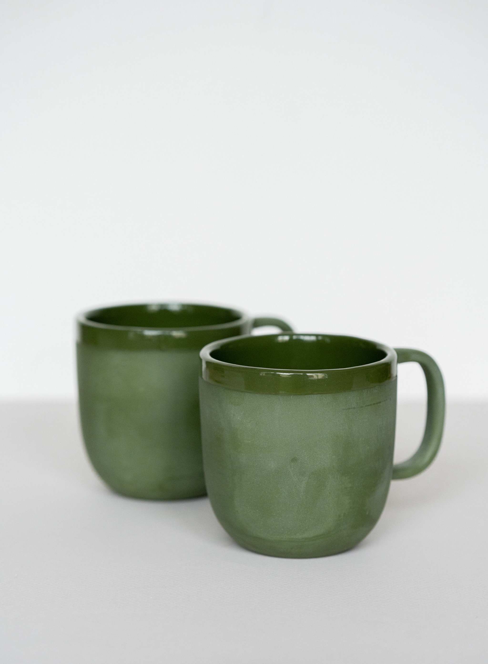 Handgemachter Porzellan-Kaffeebecher. Grün