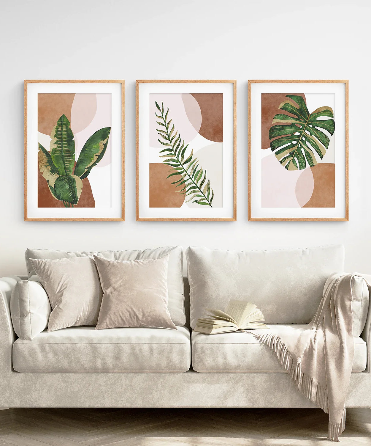 3-teilige Terrakotta Boho Wandkunst. Grüne tropische Blätter
