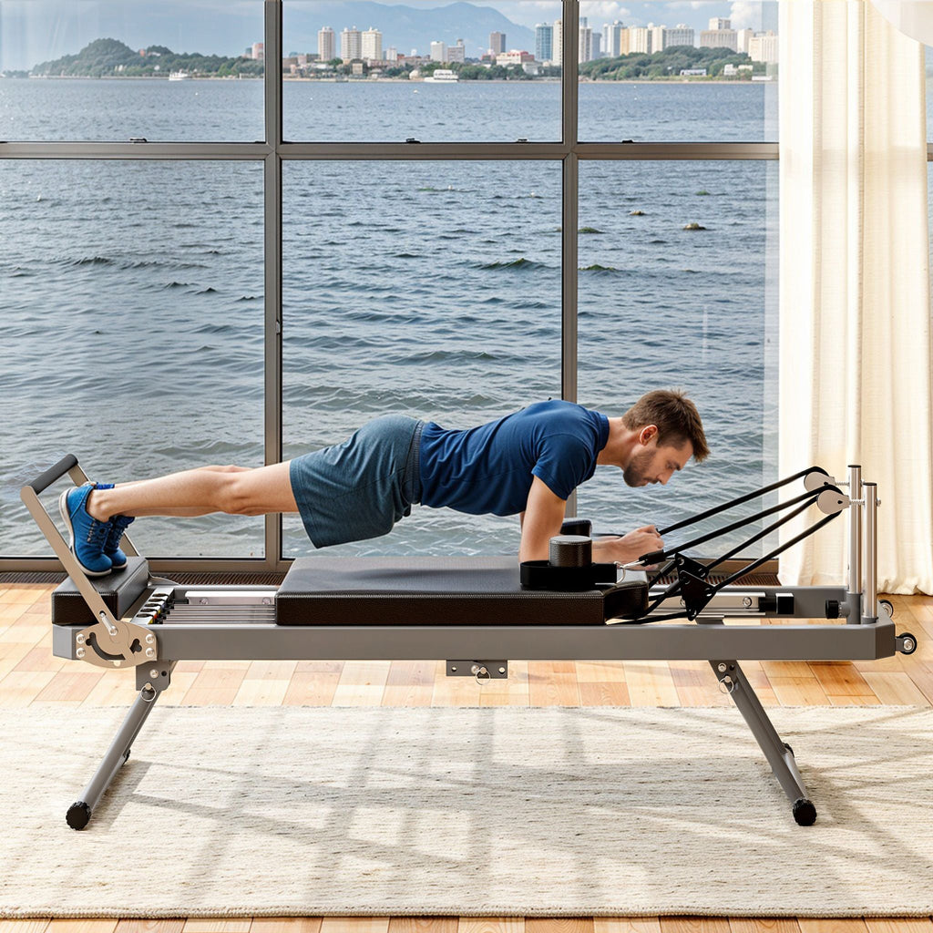 Core Pilates Extra-Large Multi-Functional Pilates Reformer Machine With Dynamic Resistance Cords And Aerobic Rebounder, Black (SAK32879)