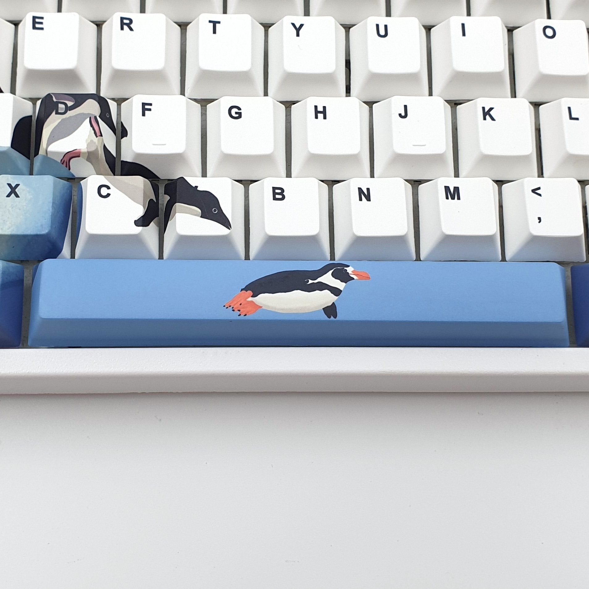 Penguins artist keycap set by Sunette